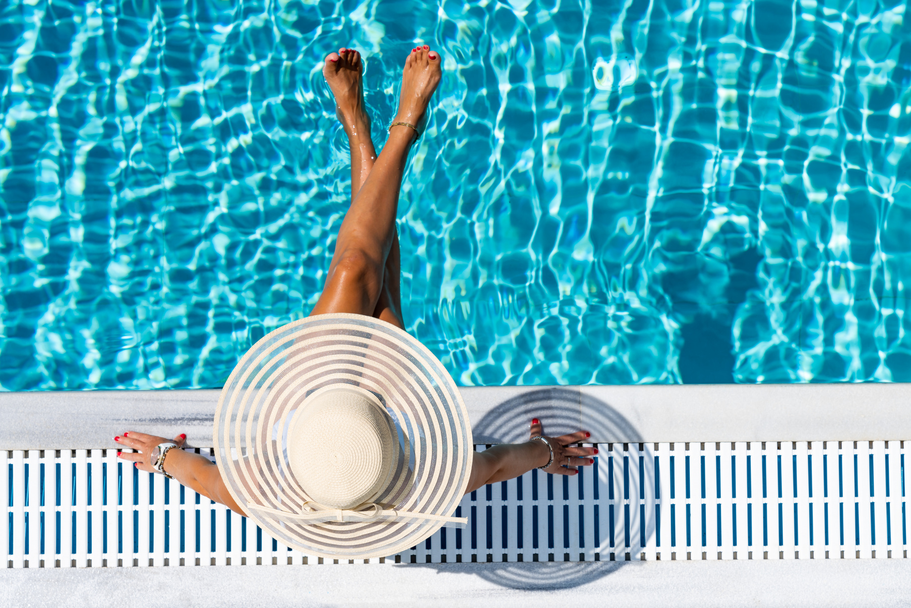 Woman Relaxing in Swimming Pool